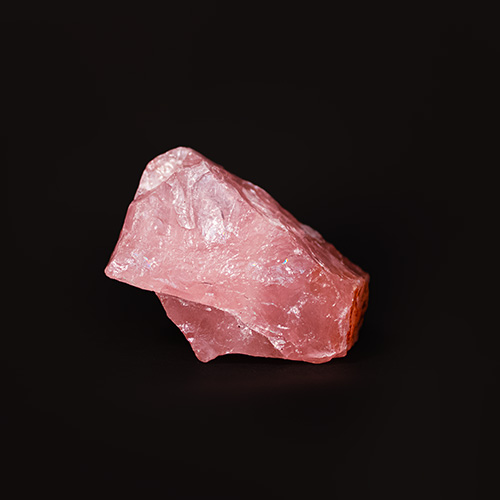 light pink medium sized gemstone with sharp edges